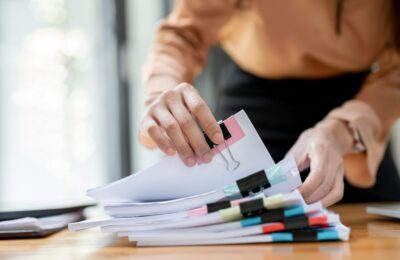 caseloads publications and videos, woman holding papers